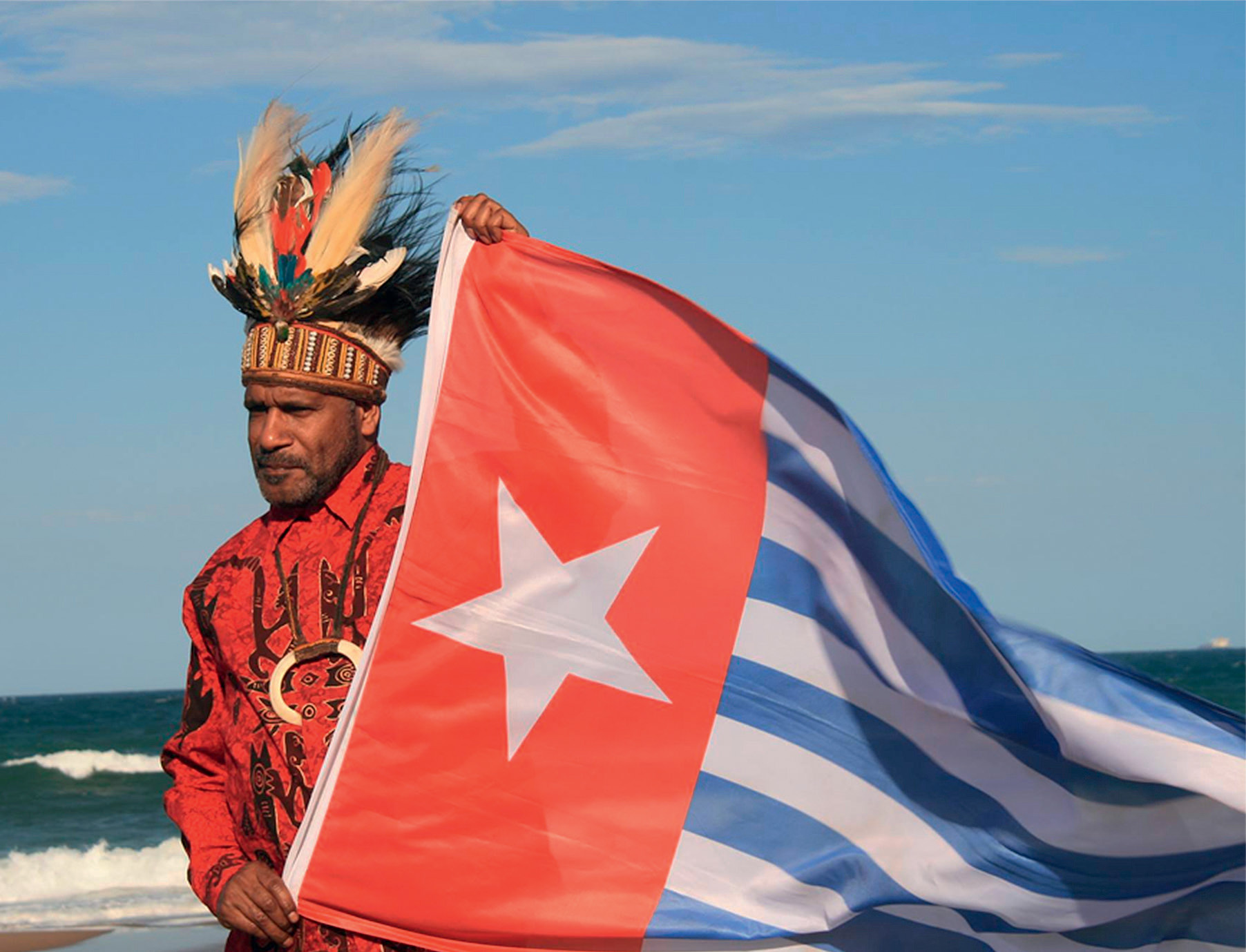 Benny Wenda with West Papua flag